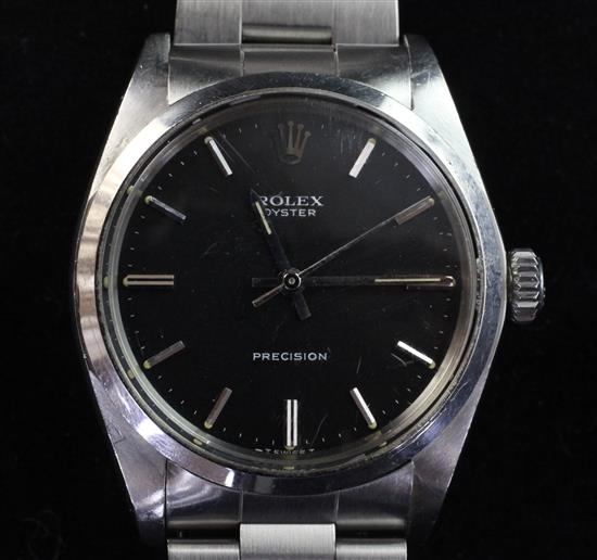 A gentlemans late 1960s stainless steel Rolex Precision manual wind wrist watch,